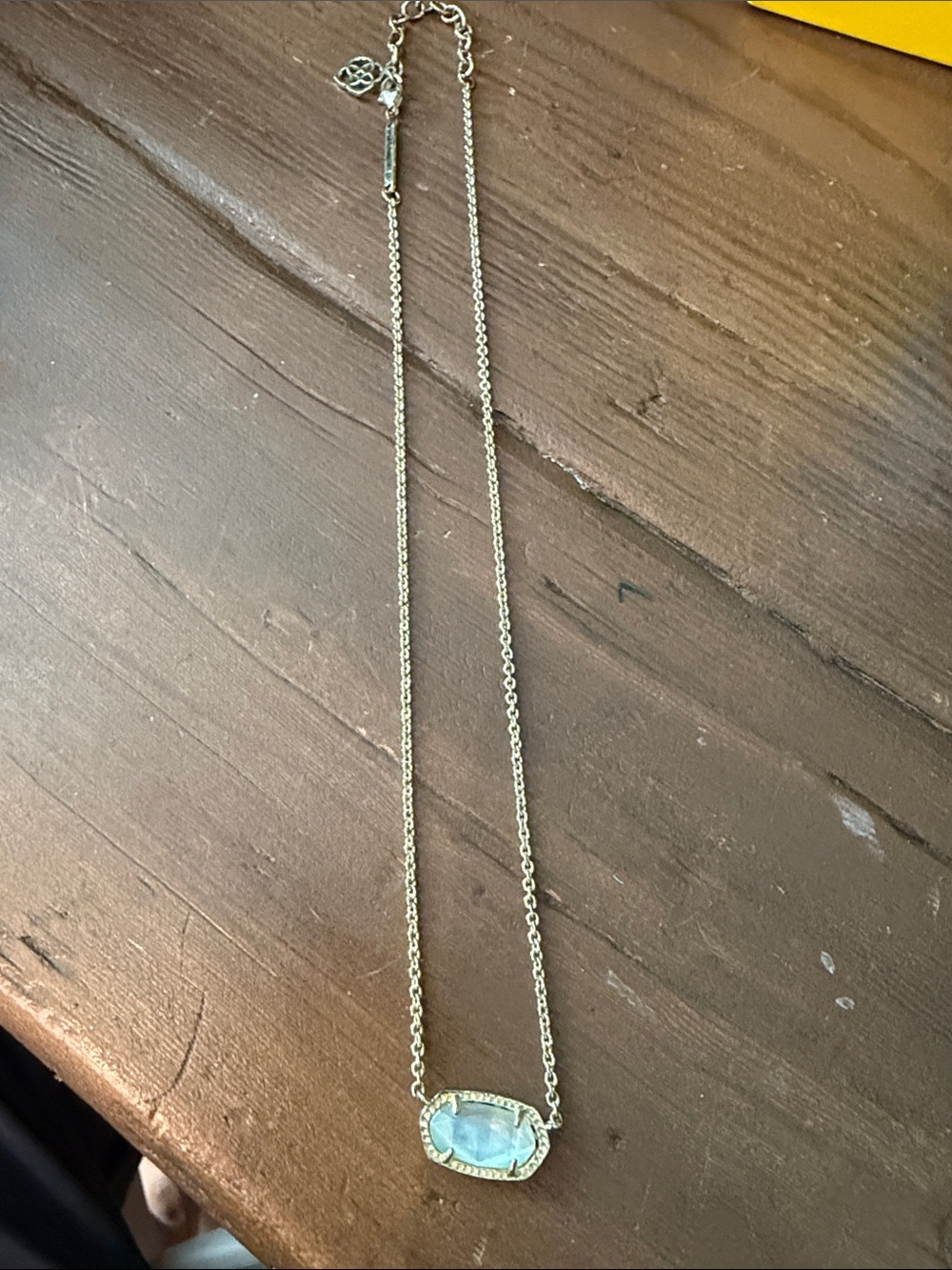 Kendra Scott Gold Chain Necklace with Light Blue Gemstone Pendant